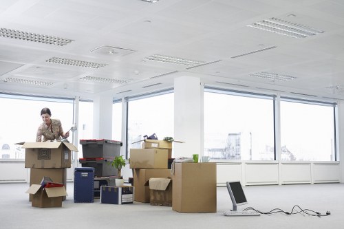 Team of movers handling furniture during a move in Finsbury Park